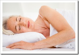 Woman lying in bed sleeping