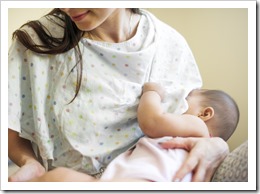 Mother is taking care of her baby.